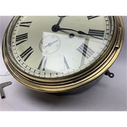 Seth Thomas ship's bulkhead clock with brass bezel and japanned case, the white dial with Roman numerals and subsidiary seconds dial D23.5cm; with key