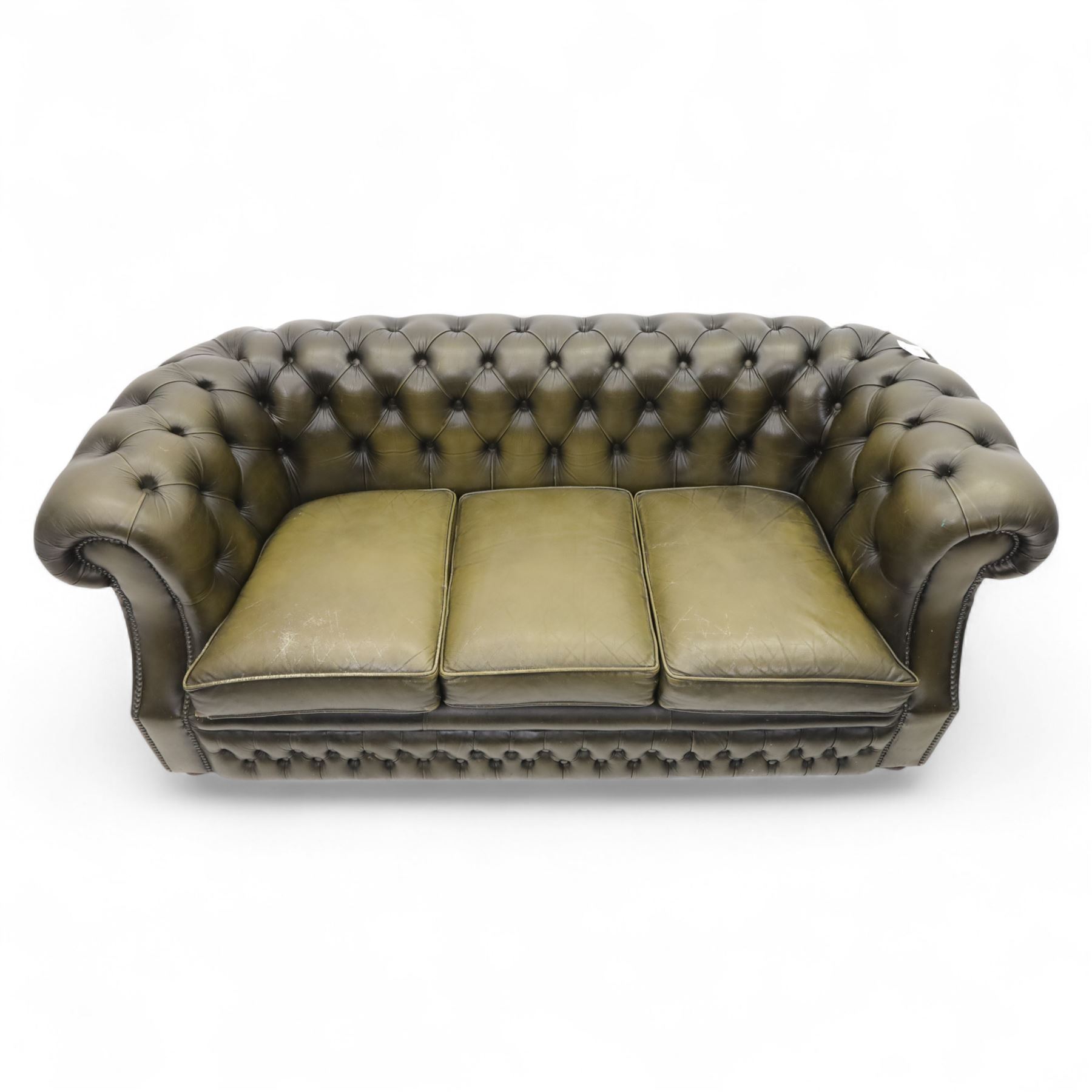 Chesterfield three seat sofa upholstered in green buttoned leather