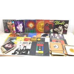 A collection of Vinyl records and single