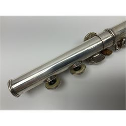 Boosey & Hawkes London Regent three-piece flute, serial no.345447; in B&H Bandhite hard carrying case; and Deg Music Company Inc. USA Claudel Model three-piece flute, serial no.491718, in hard carrying case (2)