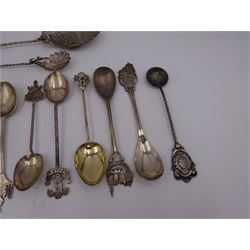 Set of six 1920s silver coffee bean spoons, together with a collection of silver souvenir and similar spoons, including two filigree examples, all tested or hallmarked