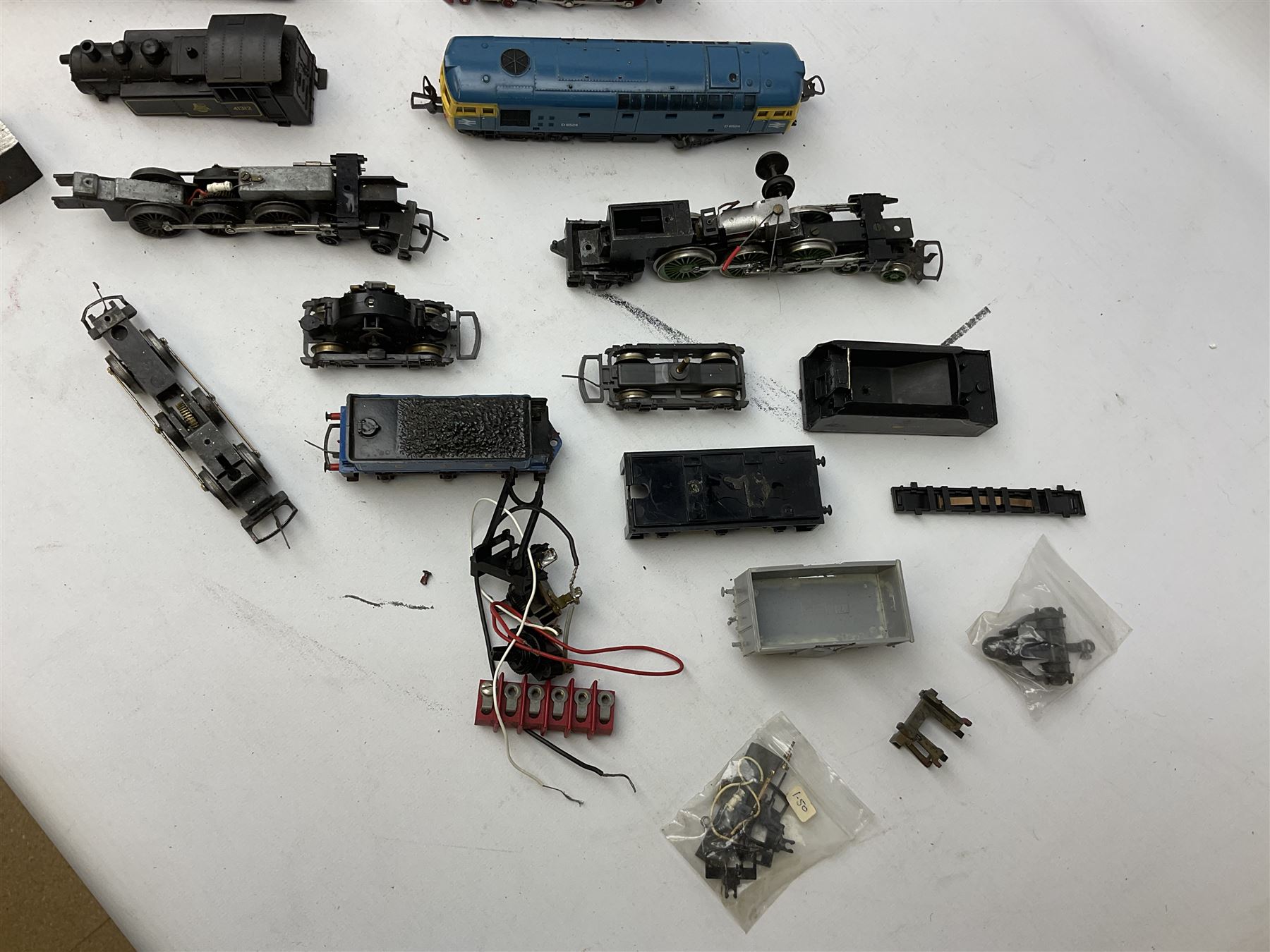 '00' gauge - Tri-ang 'Caledonian Single' Class 4-2-2 locomotive and tender; Hornby Class 37 Diesel (English Electric Type 3) locomotive No.37063; Airfix Class 61XX 2-6-2 Prairie tank locomotive No.6167; Pocher Italy American style 4-4-0 locomotive 'Reno'; and a quantity of part locomotives, spare parts etc; all unboxed