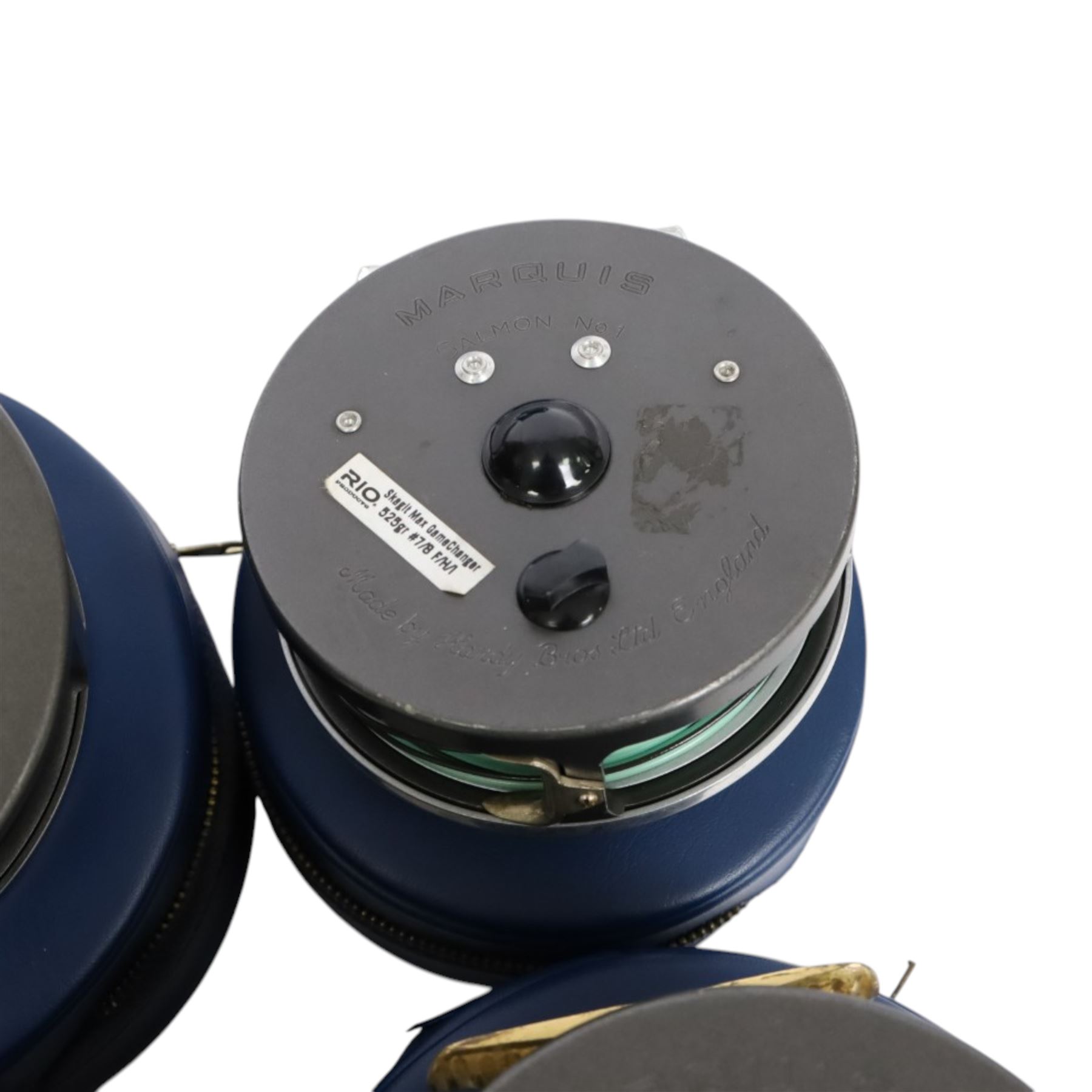 Four Hardy Bros Marquis fly fishing reels, comprising two No. 3 salmon reels, No.1 Salmon reel and a No. 10 reel, all within blue Hardy cases