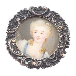 Five 19th century silver portrait brooches, two set with portraits of cherubs and three with women on ivory, three within pierced foliate surrounds. This lot has been registered for sale under Section 10 of the APHA Ivory Act