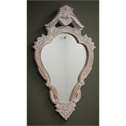  Ornate framed shaped mirror, W37cm, H64cm  
