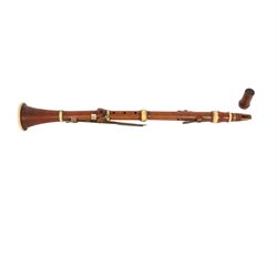 Early 19th century boxwood clarinet, each of the four sections stamped Metzler, 105 Waldou...