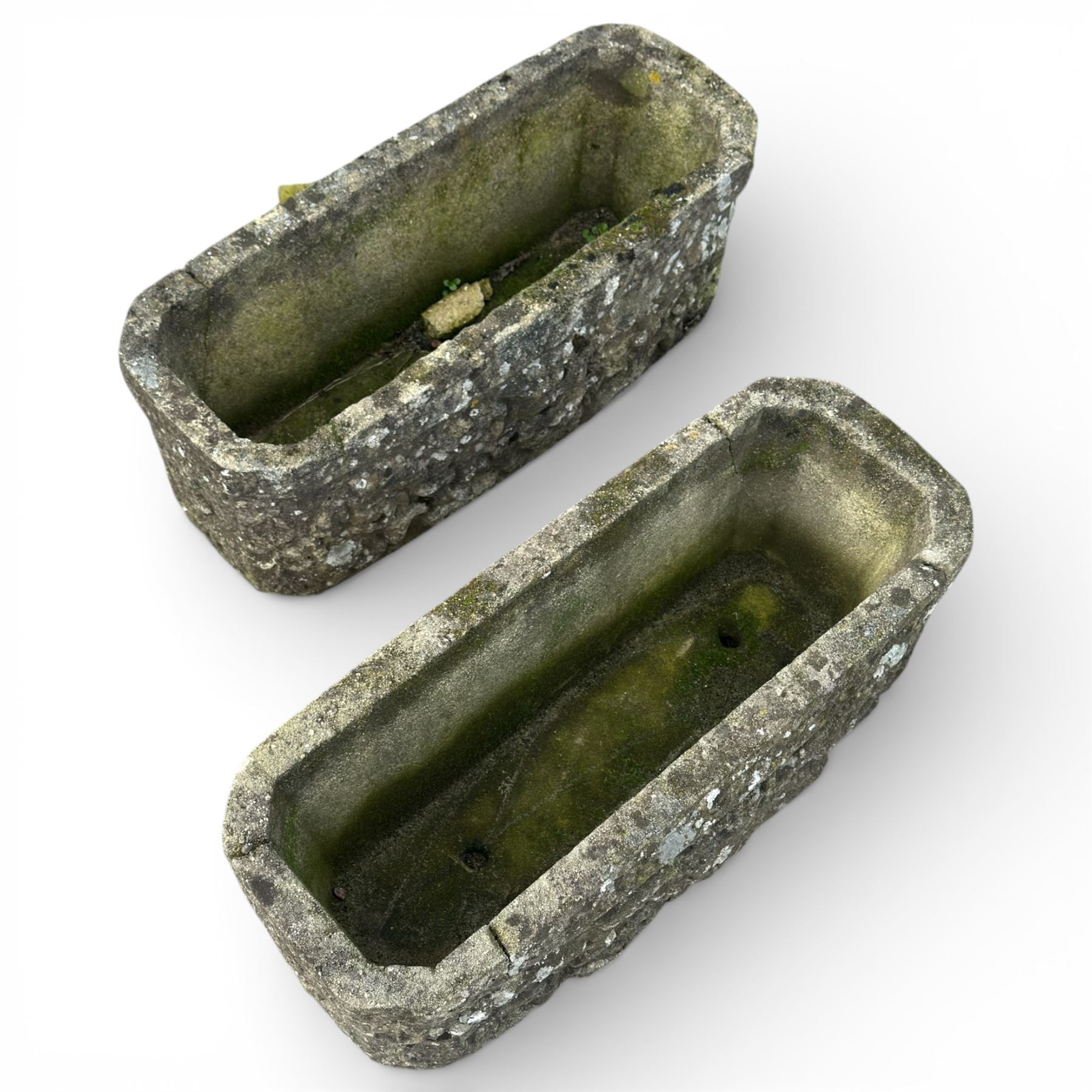 Two cast stone planters / troughs with lion emblems