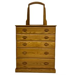Heritage furniture Ercol style elm chest, fitted with five drawers; with dressing mirror