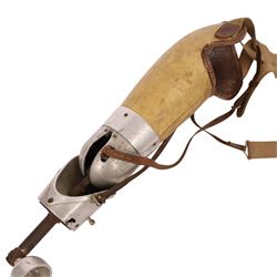 1940's prosthetic arm, possibly British, made from leather and polished aluminium, with canvas and leather straps  L47cm