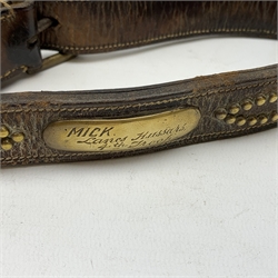 A 19th century leather and brass studded dog collar with brass plaque for Mick, Lancs Hussars 4th Troop, on bronze chain with antler handle 