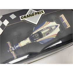 Three Paul's Model Art Grand Prix 1:18 scale die-cast racing cars - Williams Renault FW17 D. Hill; Ferrari 412 T1 J. Alesi; and Ligier Honda JS41 M. Brundle; all boxed (3)