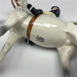 Beswick hunting group, comprising huntswoman on dappled grey horse no 1730, huntsman on bay horse no 1501, two fox figures no 1440 and 1748, and four fox hounds, all with printed marks beneath (8)