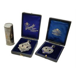 Contemporary silver cylindrical spring action coin holder, stamped T Ltd Birmingham 1962, together with two late 19th century silver and enamel Hull Senior League cricket medals, both hallmarked Birmingham and boxed