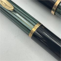 Pelikan Souveran 140 fountain pen, the green and black striped barrel and cap with gold plated beak shaped clip and bands, with gold nib stamped 14C-585, together with matching push ballpoint pen, largest L13cm