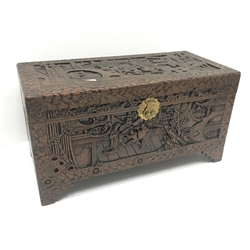 Eastern carved camphor wood blanket box depicting village scene, W94cm, H49cm, D45cm   