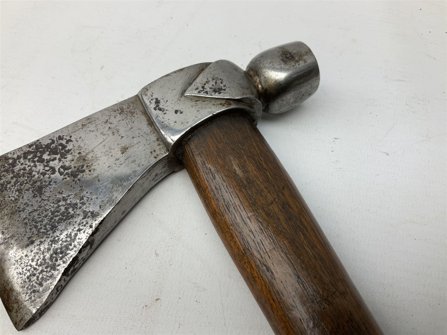 Early 20th century ceremonial Tomahawk pipe, steel axe head with pipe bowl, drilled drawing shaft, 46cm