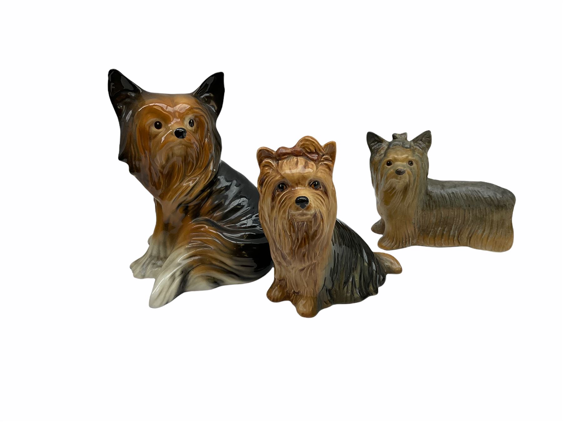 Beswick fireside Yorkshire terrier dog model no 2377 H25.5cm, together with a pair of staffordshire style white spaniels H30cm, two Mella ware terriers etc.  