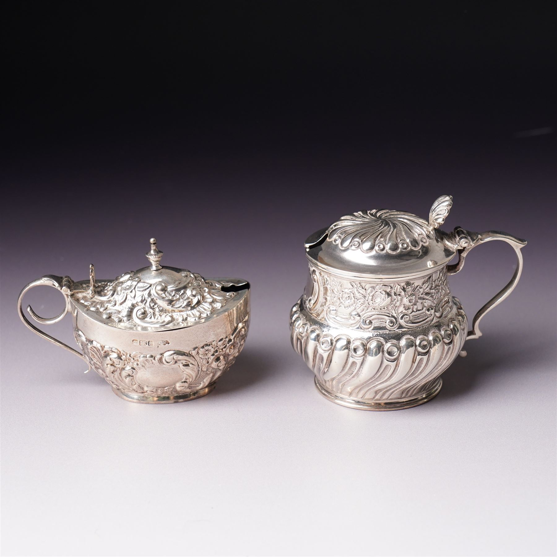 Victorian Scottish silver toddy ladle, the bowl inset with a Victorian shilling coin and with twisted whale bone handle Glasgow 1850 Maker Blaikley & Good, embossed silver drum mustard pot and and an oval mustard pot Sheffield 1902 (3)