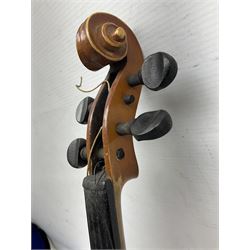 Czechoslovakian violin c1920 with 36cm two-piece maple back and ribs and spruce top, bears label 'Copy of Antonius Stradivarius Made in Czechoslovakia' L59cm; in carrying case; 1950s Czechoslovakian violin; and 195os Czechoslovakian three-quarter size violin; both cased (3)