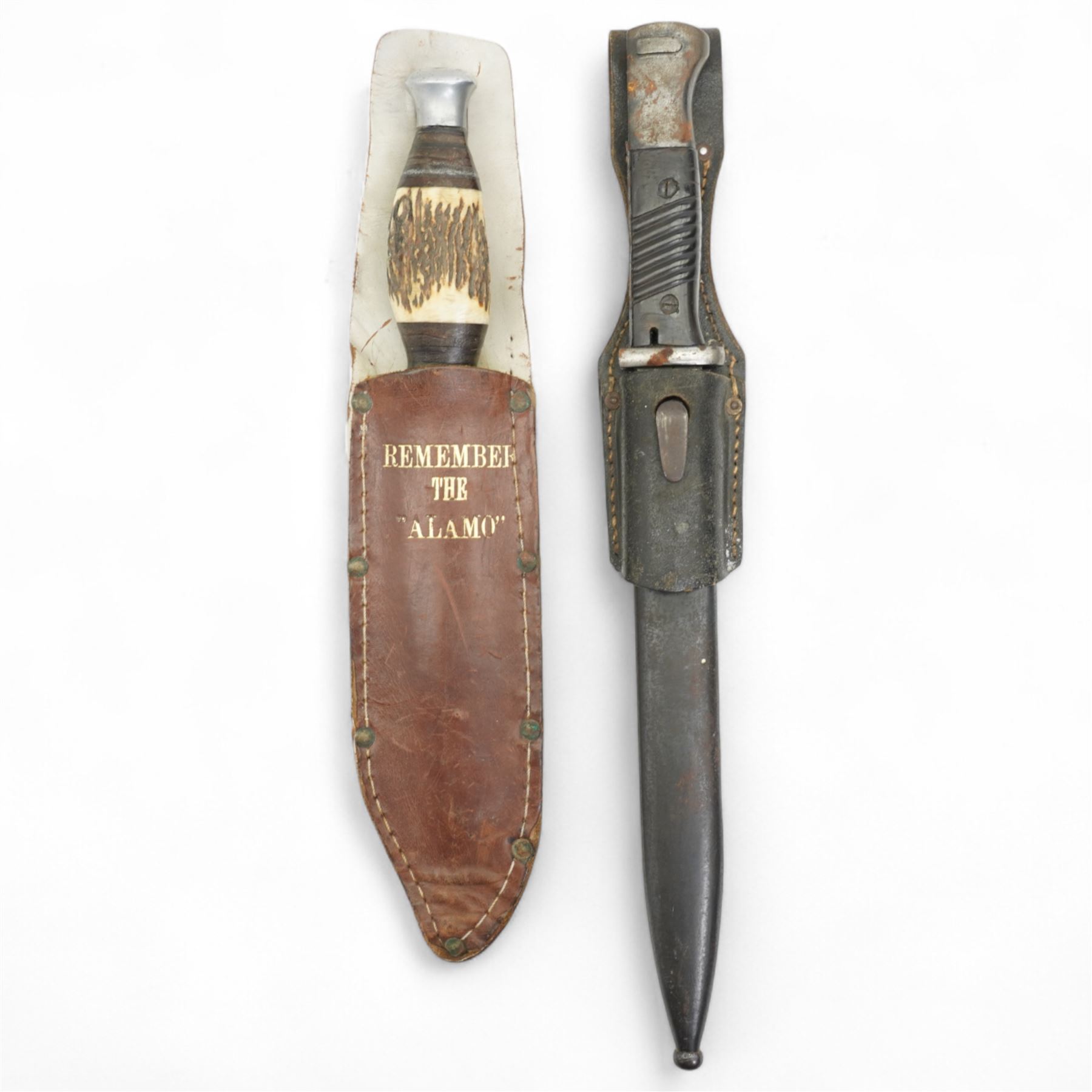 German WWII Mauser bayonet stamped AWS with scales, the leather frog marked Leipzig 1942 and a reproduction 'Remember the Alamo' Bowie knife (2) 