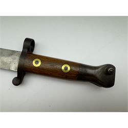 WWII Lee Metford rifle bayonet with original scabbard marked 586, with canvas frog, L44cm overall 
Notes; due to the condition of the bayonet it is possible this was issued to the home guard