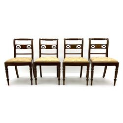 Set of fourteen Regency mahogany dining chairs, twelve side chairs with rope twist back rails above inlaid X rail, drop in upholstered seats, on turned legs, two matching carvers with hairy claw feet detail to lower arm