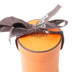 Hermès - leather tassel keyring or bag charm, taupe leather with palladium-tone split ring, with box