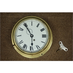  20th century circular brass cased ship's bulk head clock, single train driven movement, Roman dial with subsidiary seconds dial, D24cm  