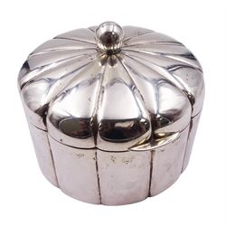 20th century Continental silver box, of circular lobed form, the hinged cover with ball finial opening to reveal a gilt interior, stamped 800, also bearing others marks, including possibly Czechoslovakian import mark, including finial H9.5cm D12cm, approximate weight 11.74 ozt (365.2 grams)