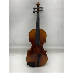 Czechoslovakian violin c1920 with 36cm two-piece maple back and ribs and spruce top, bears label 'Copy of Antonius Stradivarius Made in Czechoslovakia' L59cm; in carrying case; 1950s Czechoslovakian violin; and 195os Czechoslovakian three-quarter size violin; both cased (3)