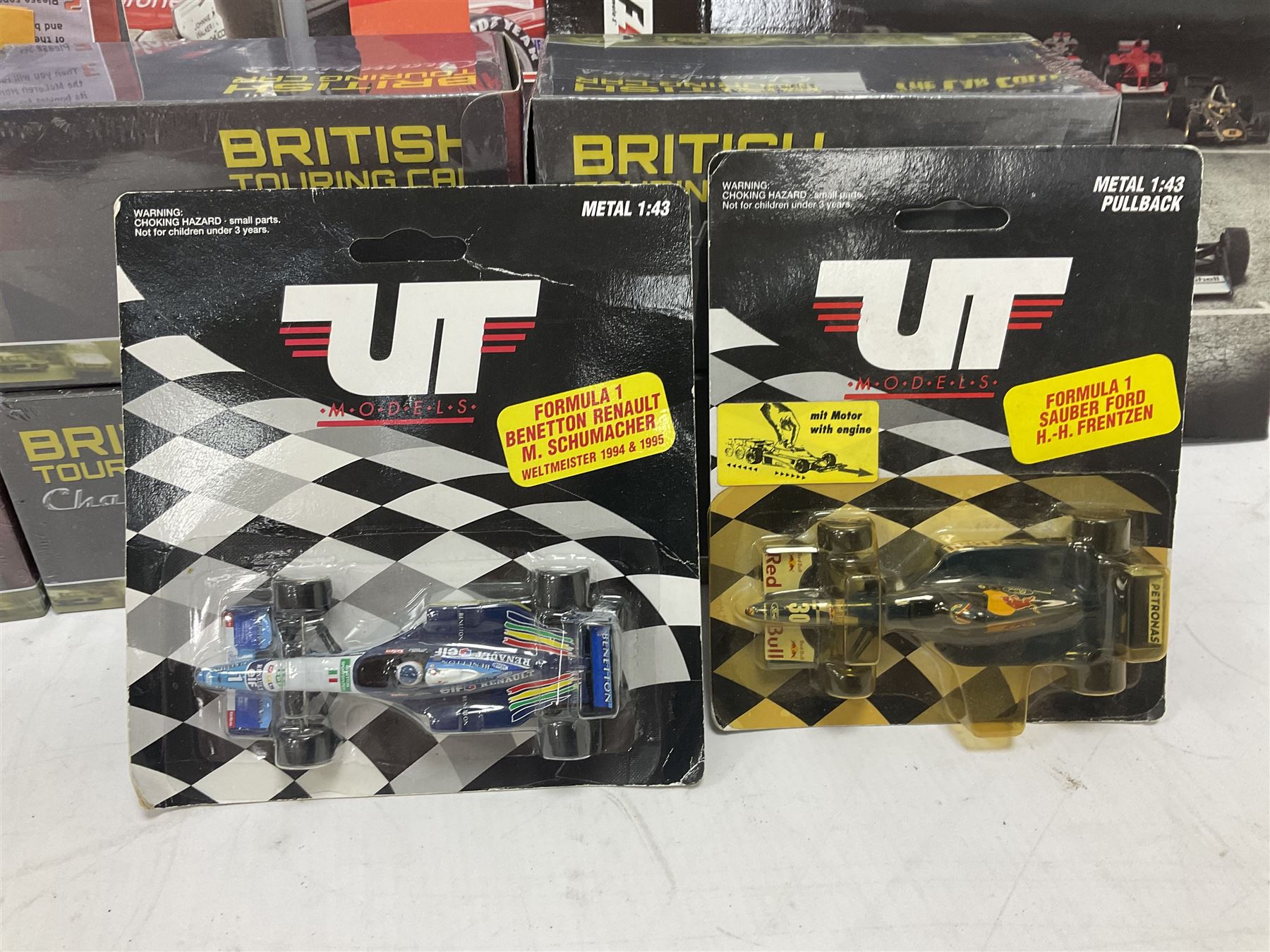 Panini Formula 1 The Car Collection - twelve blister packed racing cars and quantity of periodicals; nine mostly unopened Atlas Editions British Touring Car Champions; and six other boxed/blister packed die-cast models of racing cars