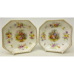  Pair early 20th century Berlin pottery dishes, hand painted with courting couple within a floral border, L12cm   