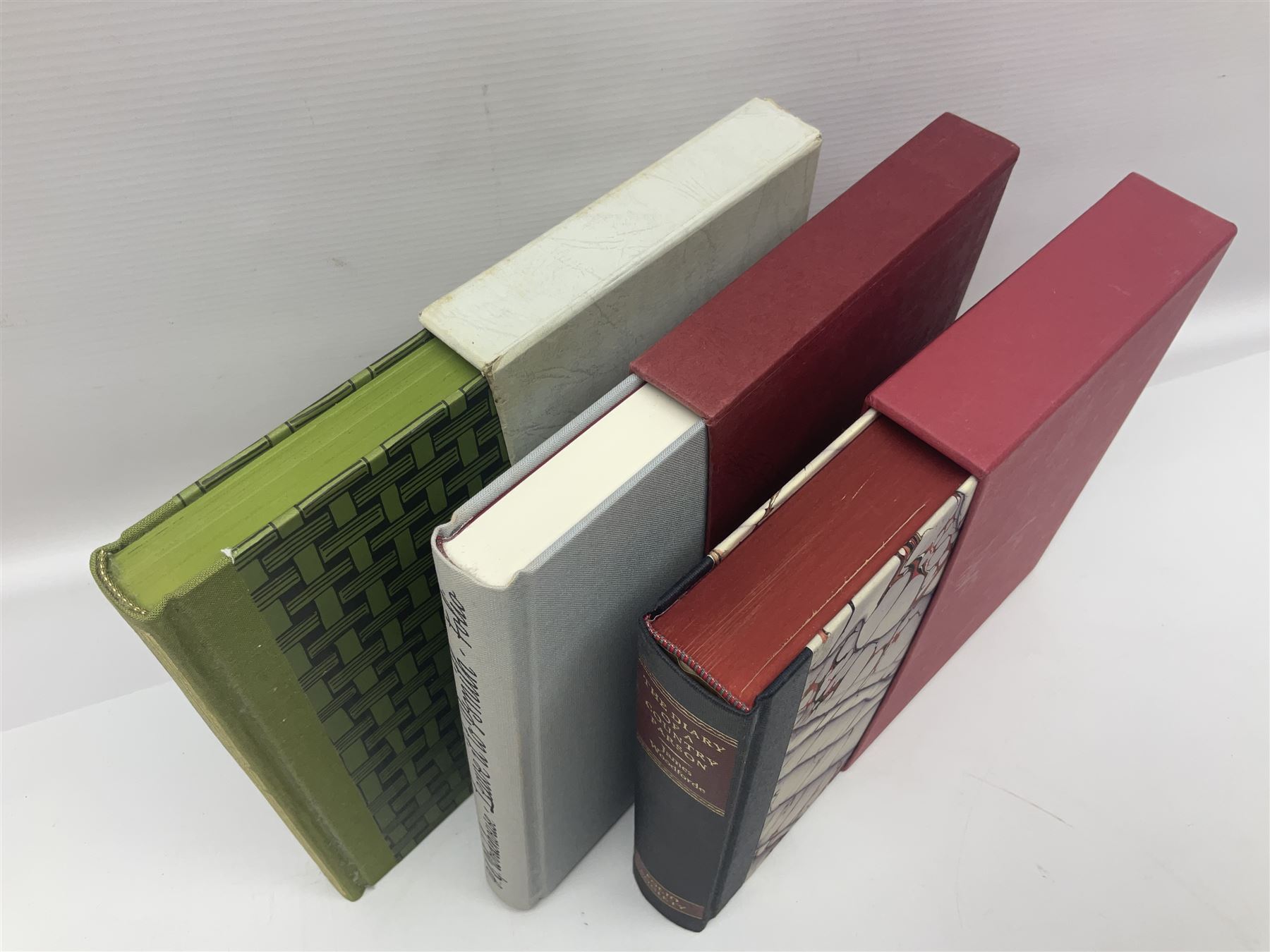 Seven Folio Society books, including The Divine Comedy, Charles Dickens Christmas Book, The Proud Tower, etc, all with outer sleeves