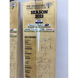 Two signed Yorkshire County cricket bats, from 2011 and 2012 seasons, bearing signatures including Adil Rashid, Andrew Gale, Ryan Sidebottom, Gary Ballance etc