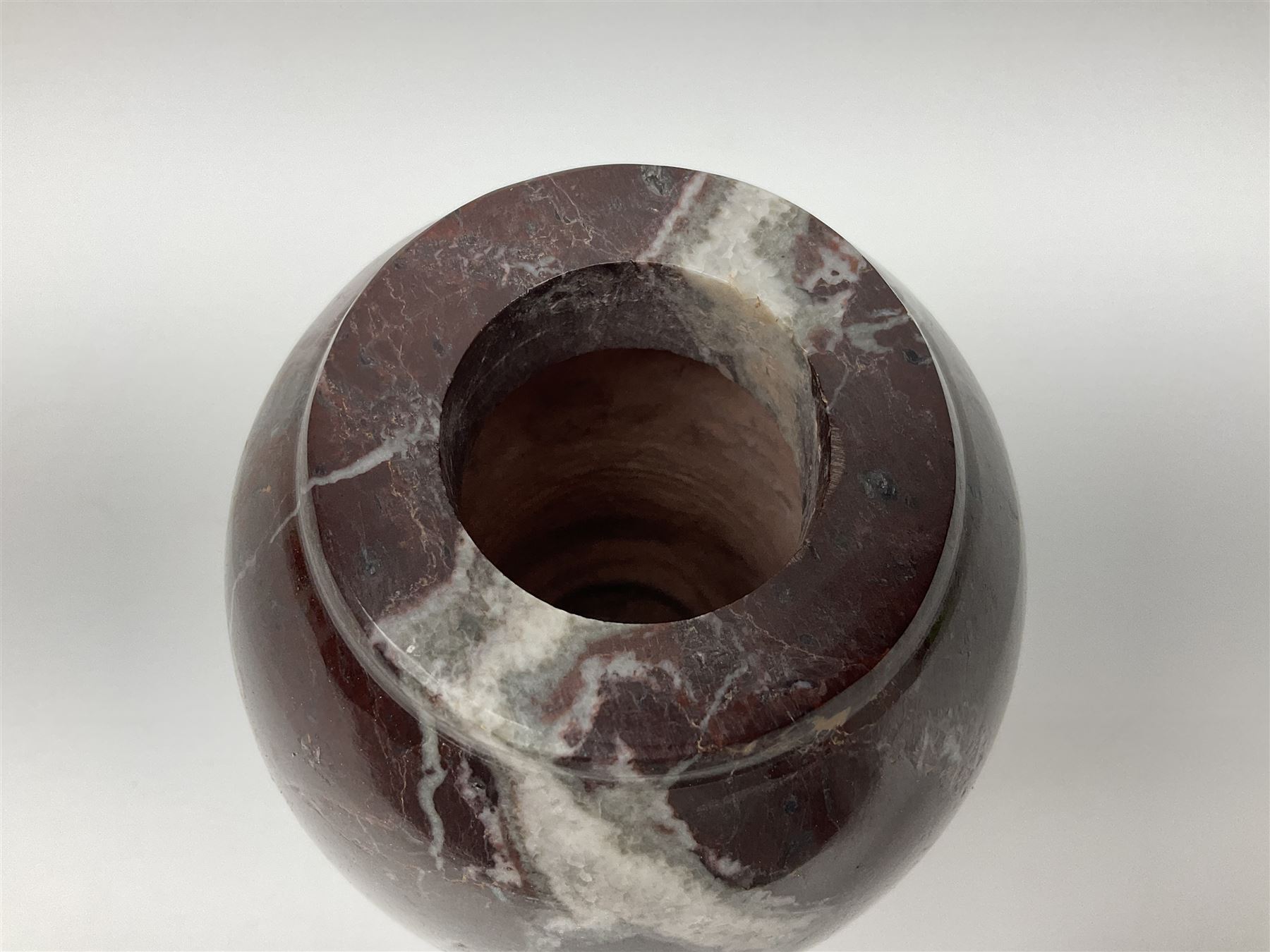 Red marble vase, of baluster form, H18cm