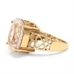 9ct gold kunzite ring, four claw set with a single oval cut kunzite, pierced design gallery and shoulders
