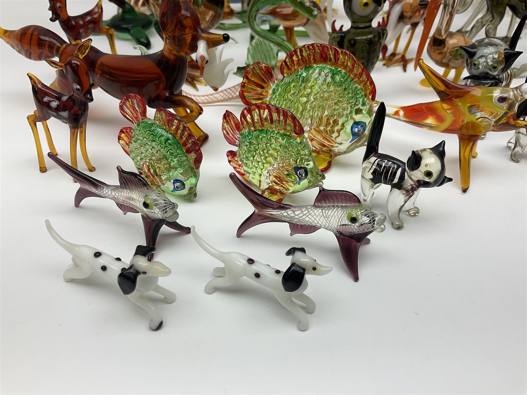 Large collection of hand-blown glass animals and figures, to include fish, birds, cats, dogs, monkeys etc