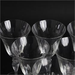 Set of six Murano clear glass wine glasses, each with part moulded fluted flared bowl, upon a knopped and fluted baluster stem and spreading circular foot, with etched marks beneath, H19.5cm