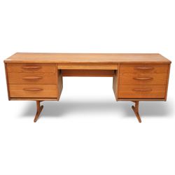 Austinsuite - mid-20th century teak dressing table or desk, fitted with seven drawers