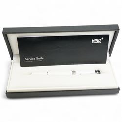 Montblanc 'Bonheur' fountain pen, with white cap and barrel, the cap with a white metal cl...