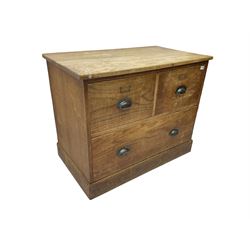 Early to mid-20th century oak chest, fitted with two short drawers over one long drawer, raised on plinth base