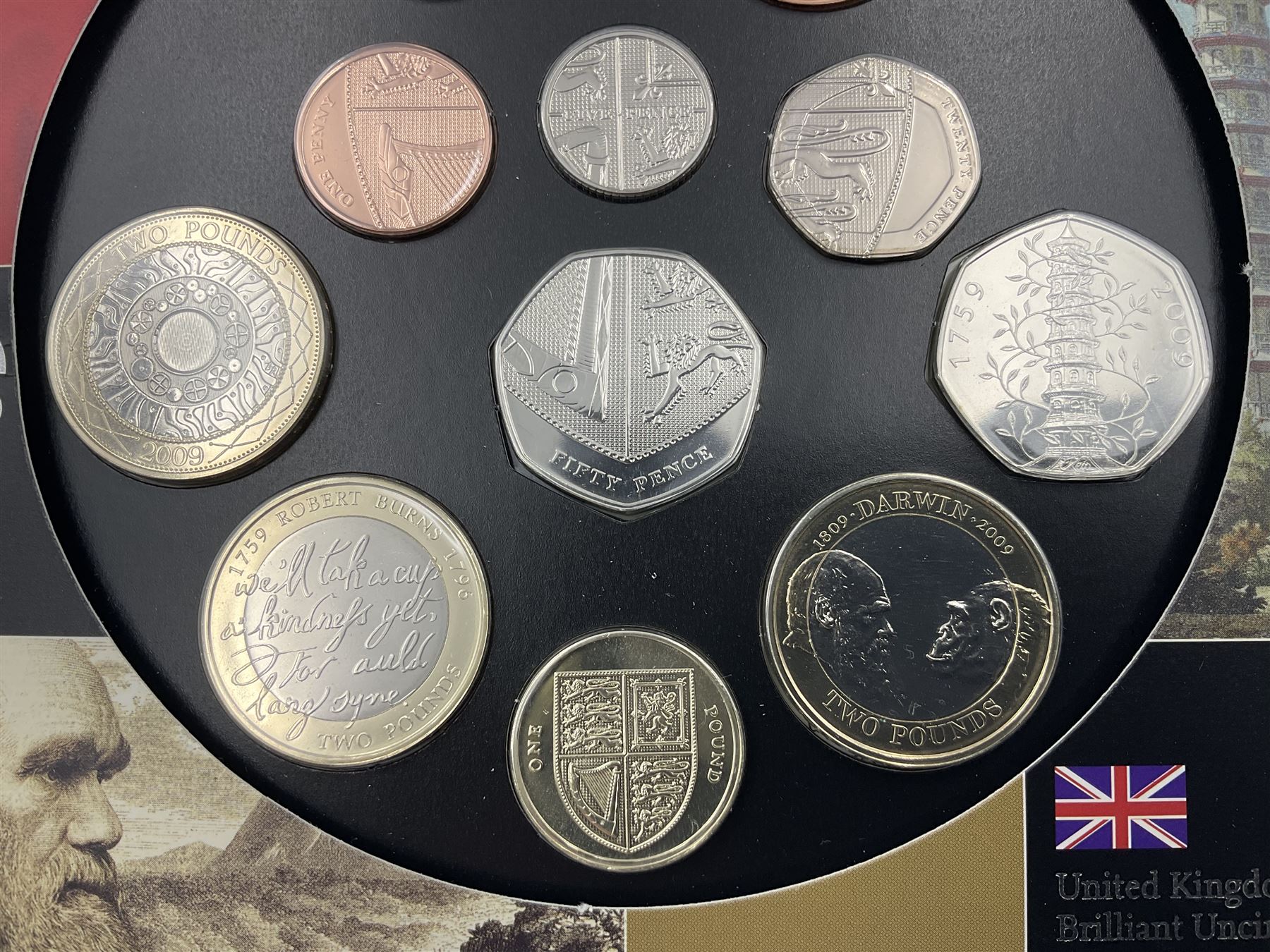 The Royal Mint United Kingdom 2009 brilliant uncirculated coin collection, including Kew Gardens fifty pence, in card folder