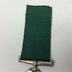Victoria Long Service in the Volunteer Force Medal awarded to 369 Bombr. W. Woodward 1st Lincs. V.A.; and reproduction Victoria India Medal with Lucknow clasp; both with ribbons (2)