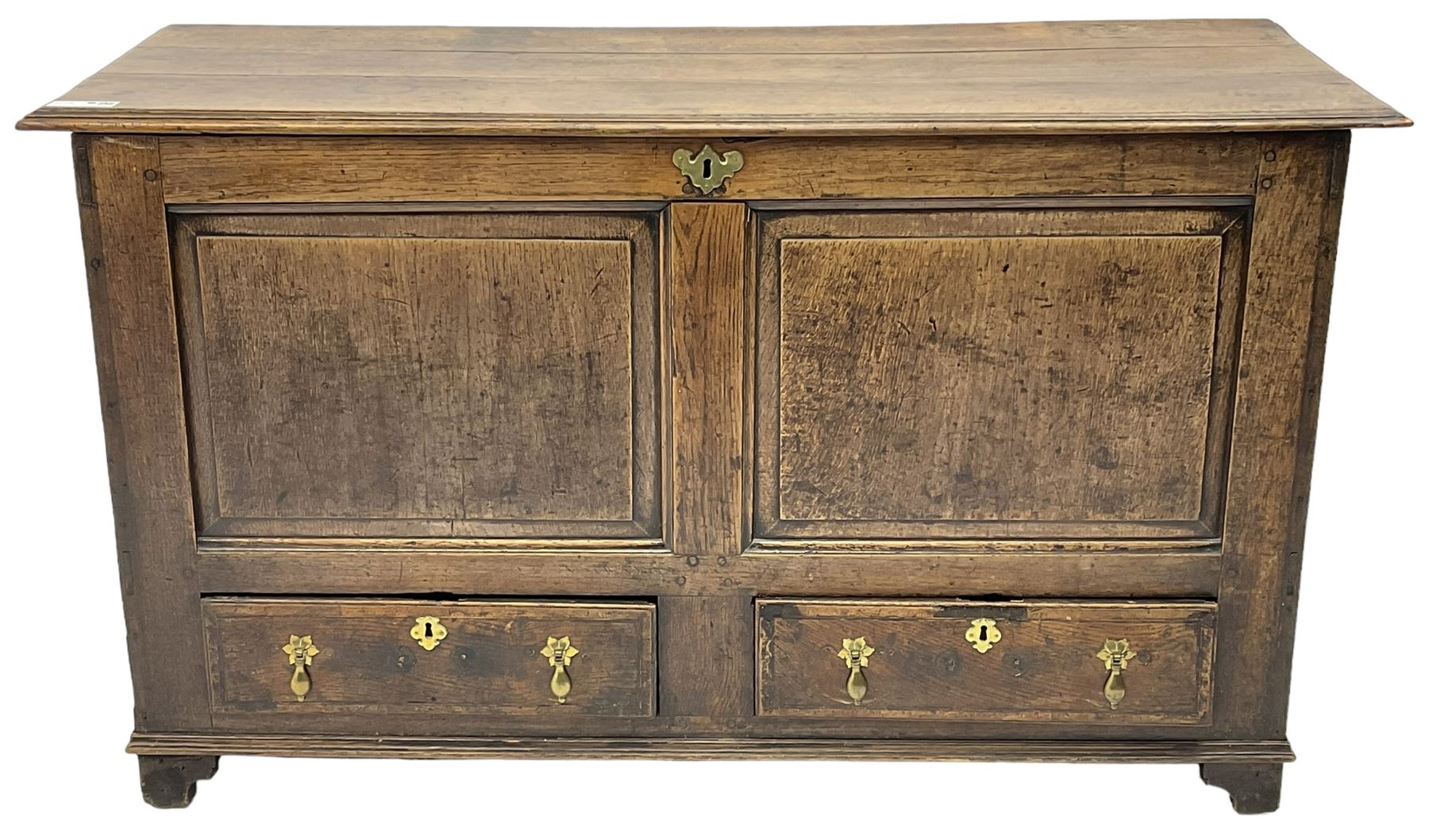 18th century oak mule chest, moulded hinged lid over panelled front, fitted with two moulded drawers