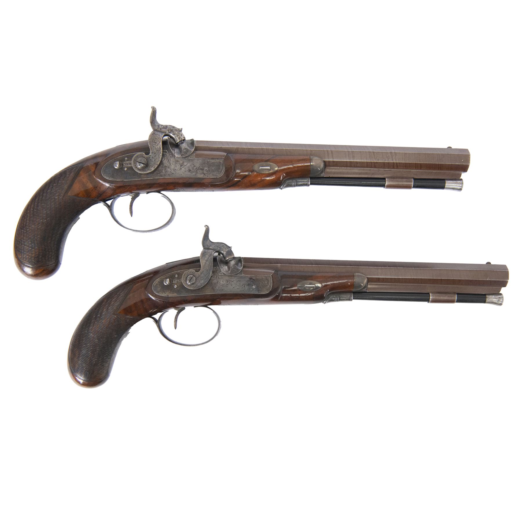 Pair of cased British officers' percussion cap dueling pistols by Braggs of London   (1932-1842), with 24cms octagonal Damascus steel sighted barrels with original browning, marked along the top Braggs 36 High Holborn London, ebony ramrods with steel caps and brass tips beneath, hammer, tang and trigger guard engraved with floral scrolls, figured walnut half stocks with chequered grips and vacant white metal cartouches, contained within a brass bound mahogany case with makers label to the lid, lined in green baize and containing bullet mould, powder flask, ram rod, percussion caps, case key and lead balls, pistol overall L40cm 