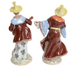 Royal Crown Derby figure Spring, together with Pair of Dresden Malabar musicians and two others    