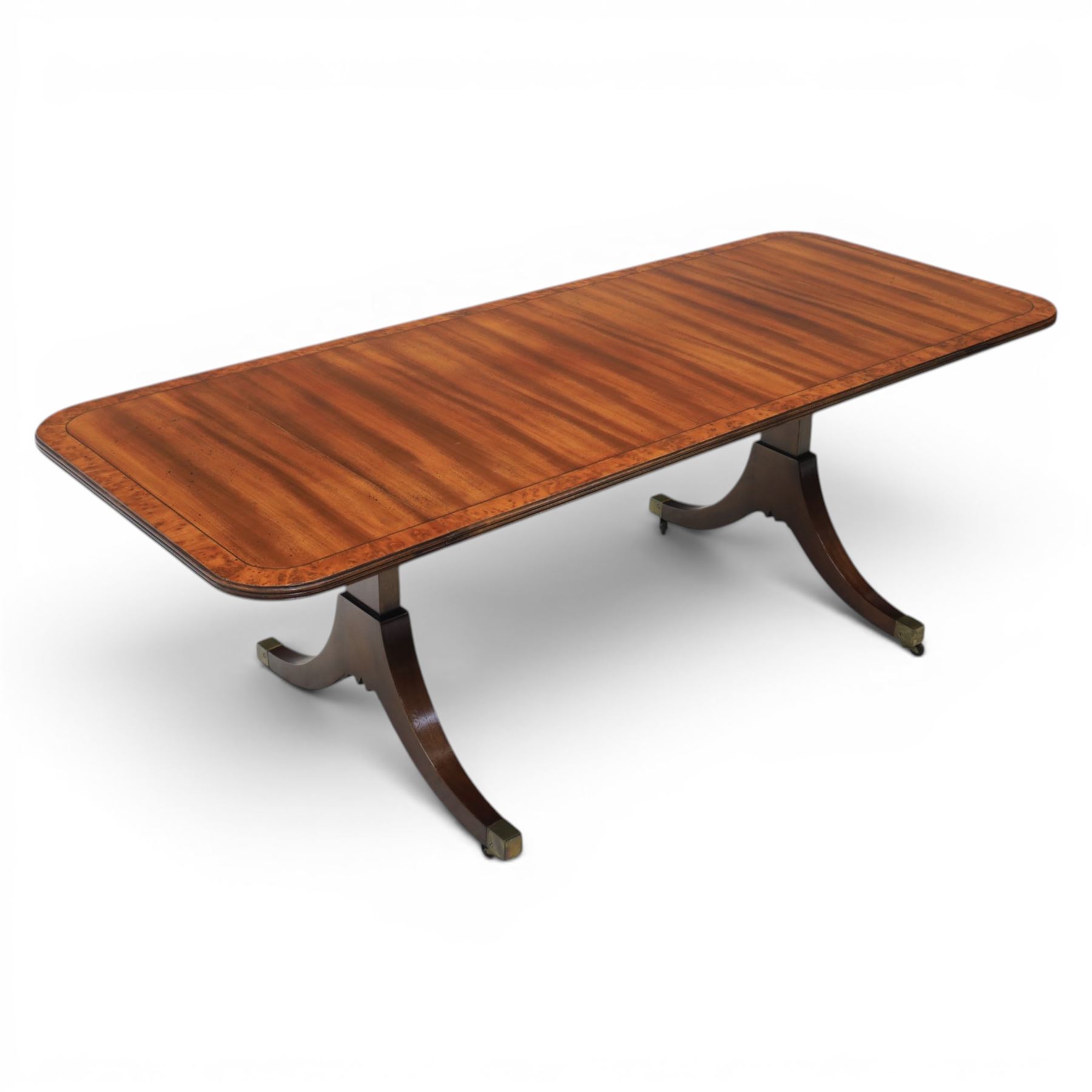 Regency design mahogany drop leaf coffee table, rectangular top crossbanded in walnut, twin pillar legs