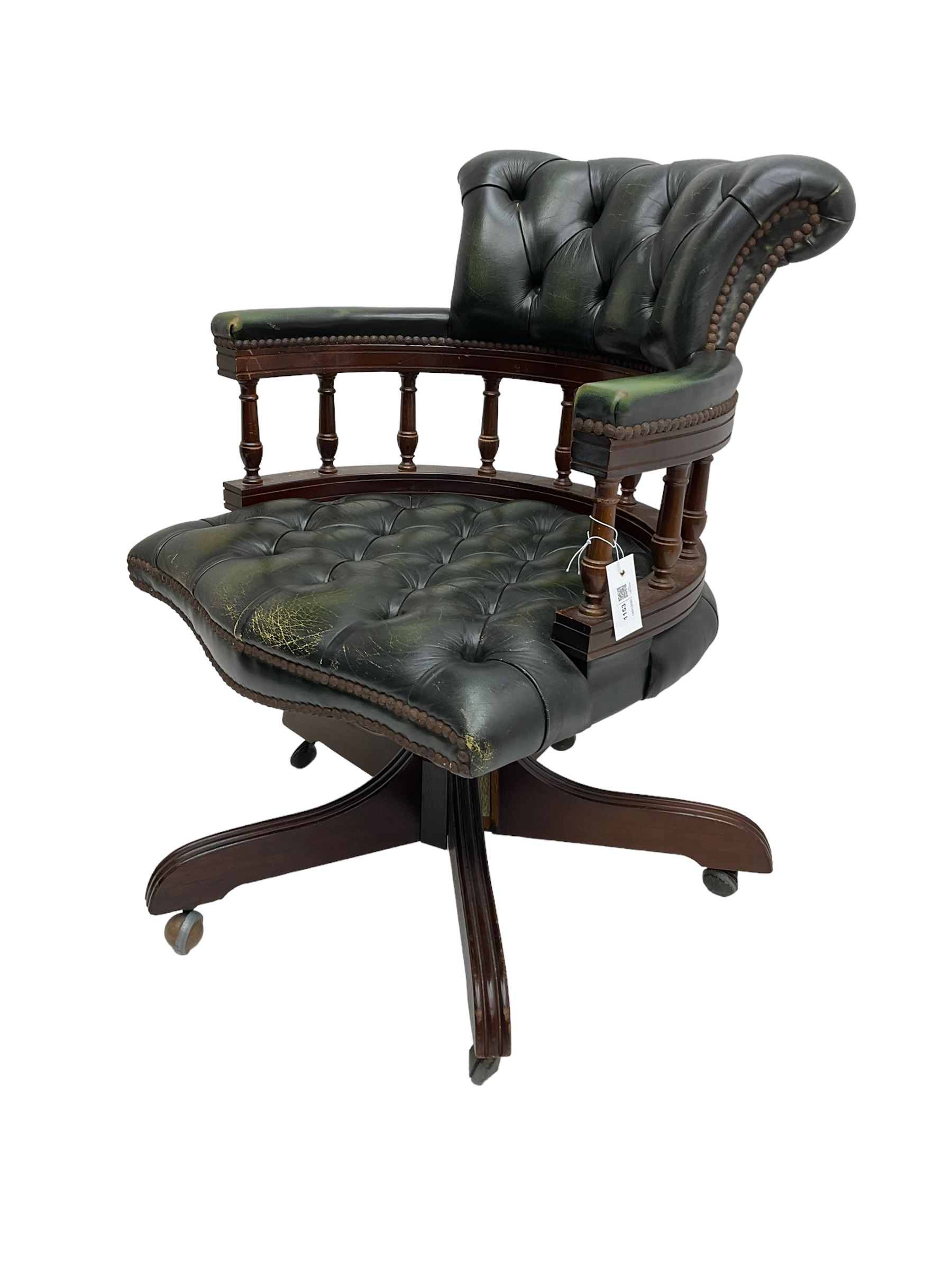 Captains swivel desk chair, upholstered in buttoned leather