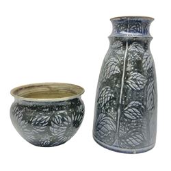 Studio pottery vase, decorated with leaves on a mottled blue/grey ground, together with a similar planter, tallest H37cm