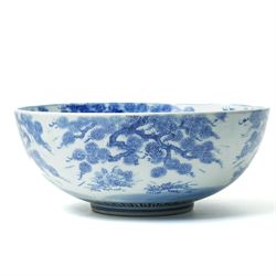 Japanese blue and white bowl, the central bowl painted with bird, surrounded by a border of trees, unmarked, D31cm 